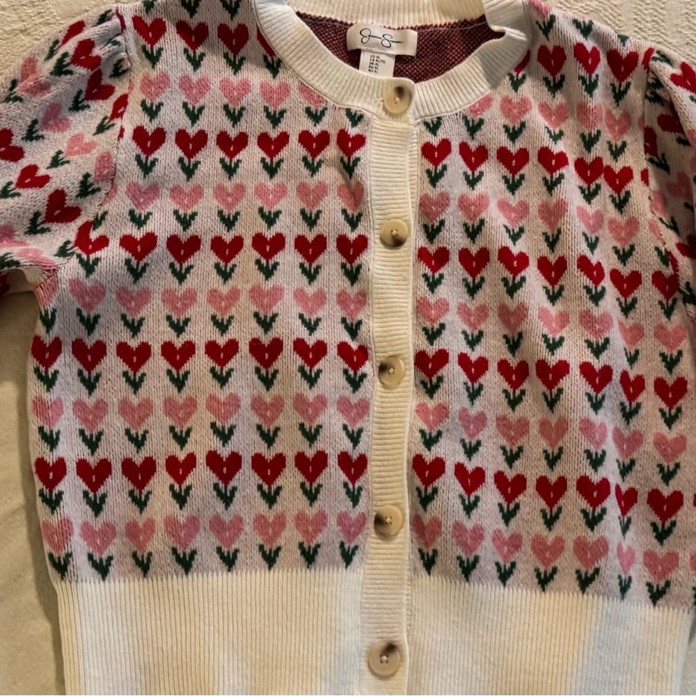 Never worn Jessica Simpson Heart Pattern Cardigan